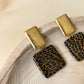 Brincos Beverly Preto & Dourado